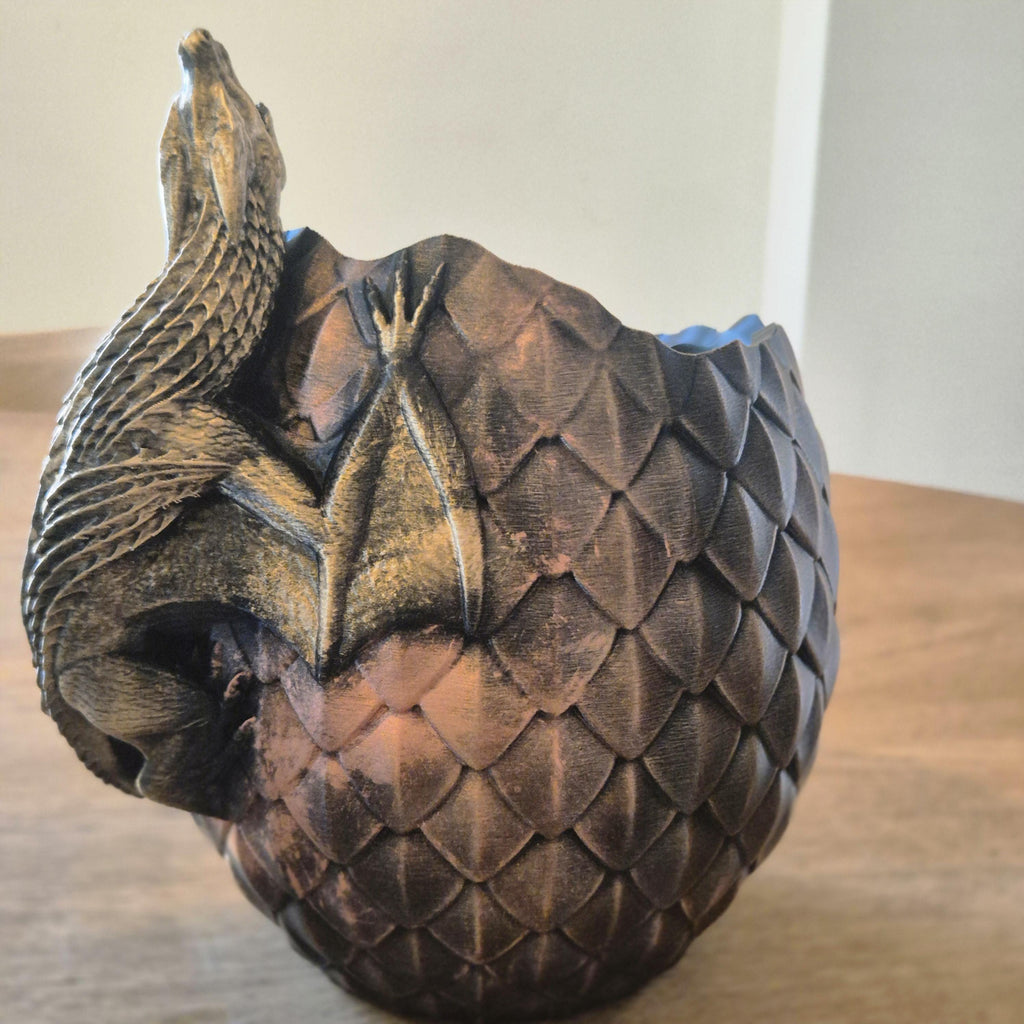 Dragon on dragon egg plant vase