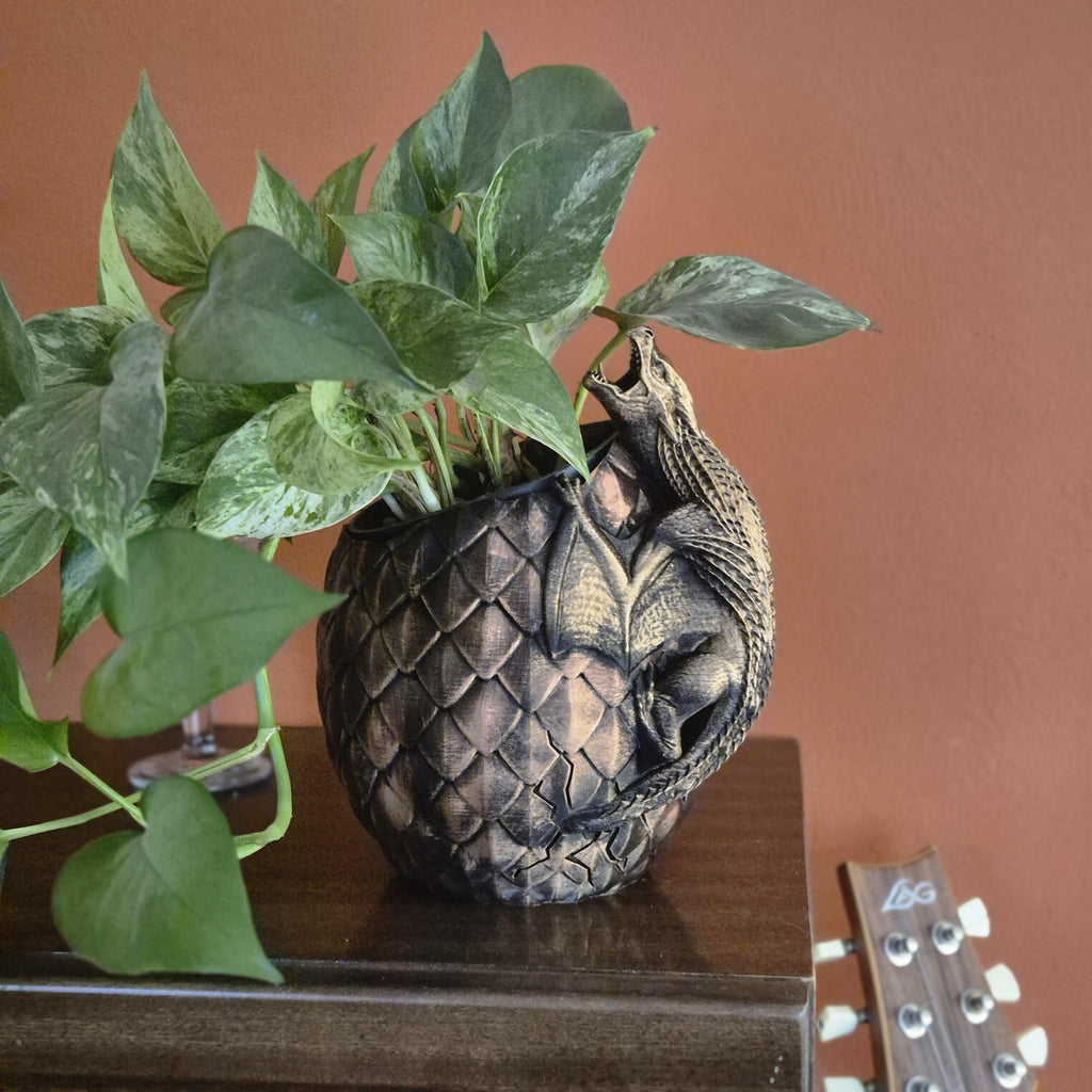 Dragon on dragon egg plant vase