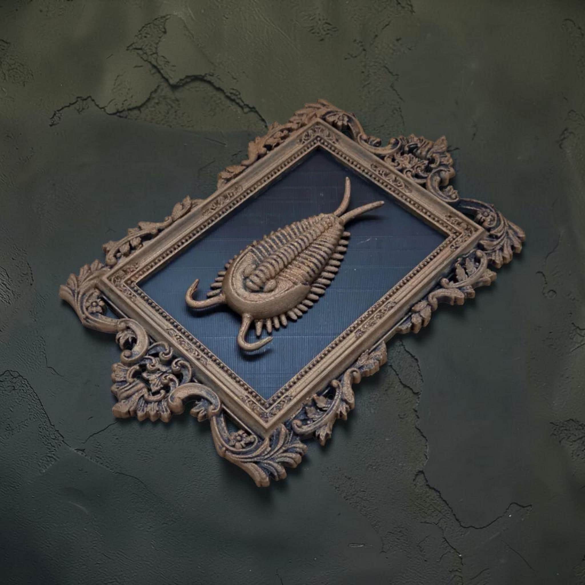 Trilobite wall plaque in ornate frame | fossil-inspired wall decor