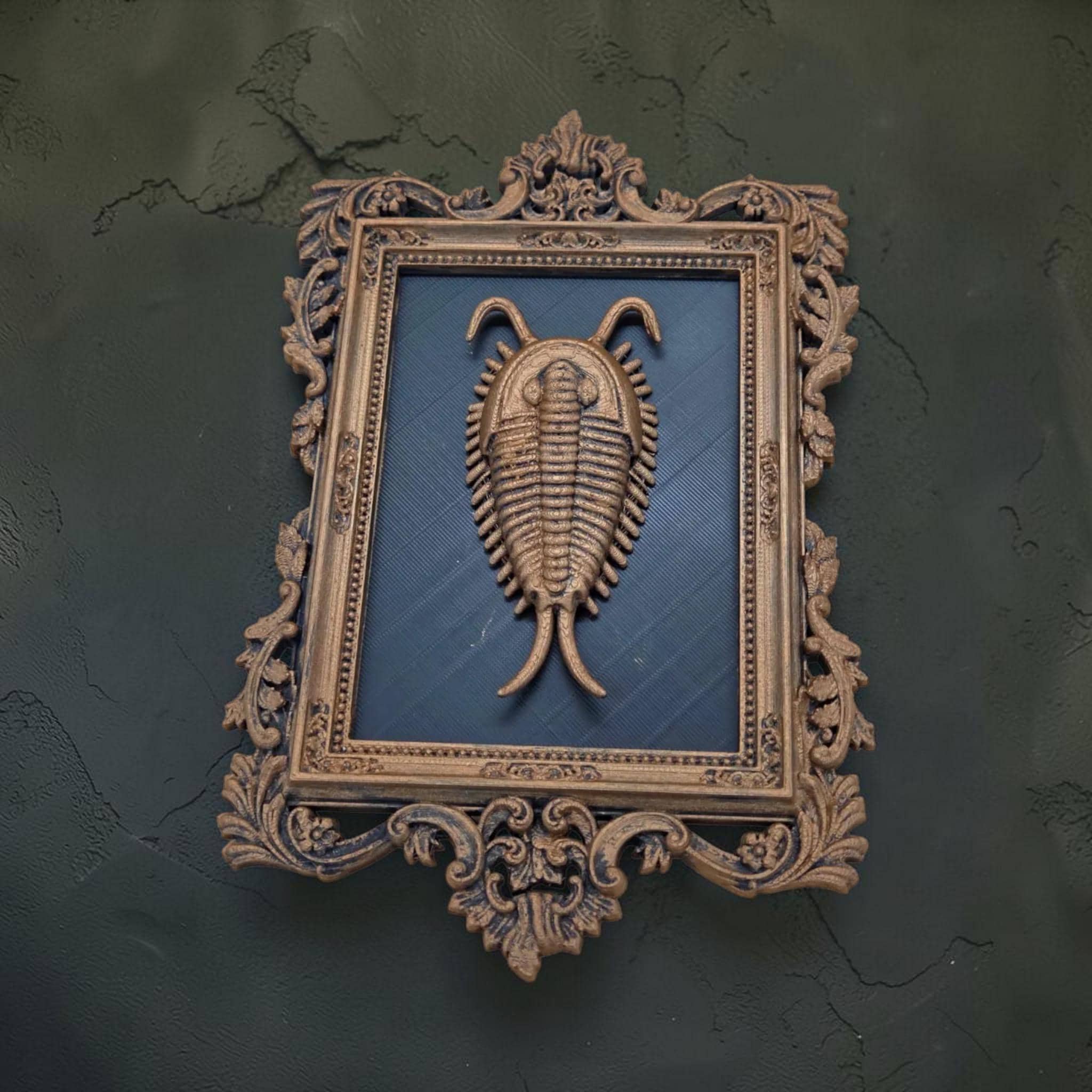 Trilobite wall plaque in ornate frame | fossil-inspired wall decor