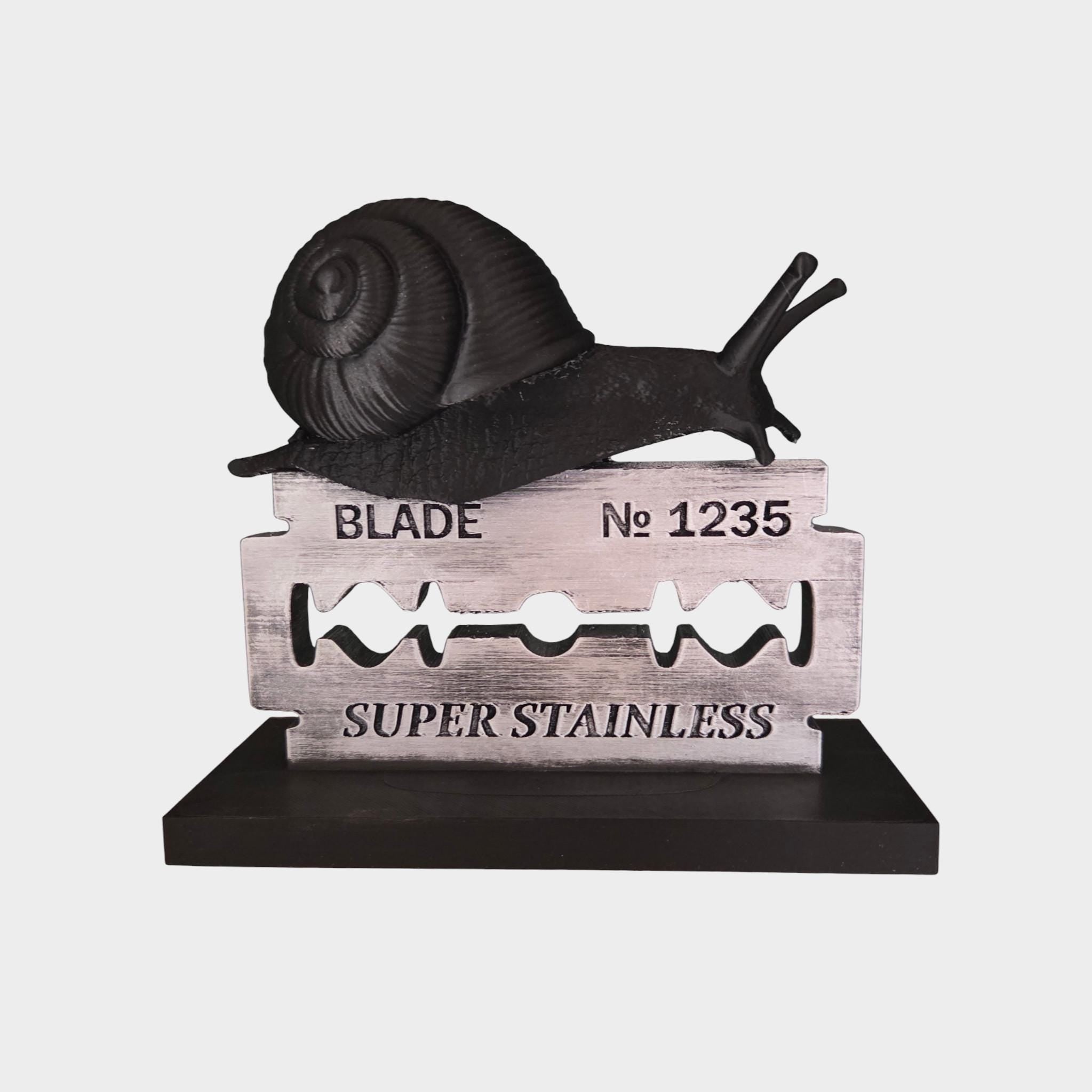 Snail on Razor Blade Figurine – “Slow but Sharp” Desk Decor – Dark Humor Sculpture – Unique Gothic & Office Decoration